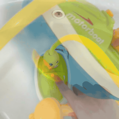 Baby Badespielzeug – Spritzende Enten & Motorboot mit Musikfunktion