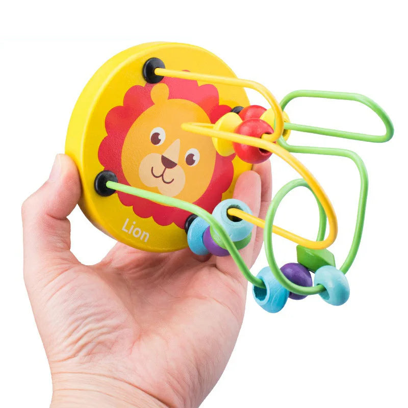 Baby Motorikspielzeug aus Holz – Montessori Lernspiel