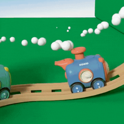 Karikatur Zugspielzeug – Musik, Pfeife & Gesichtstausch