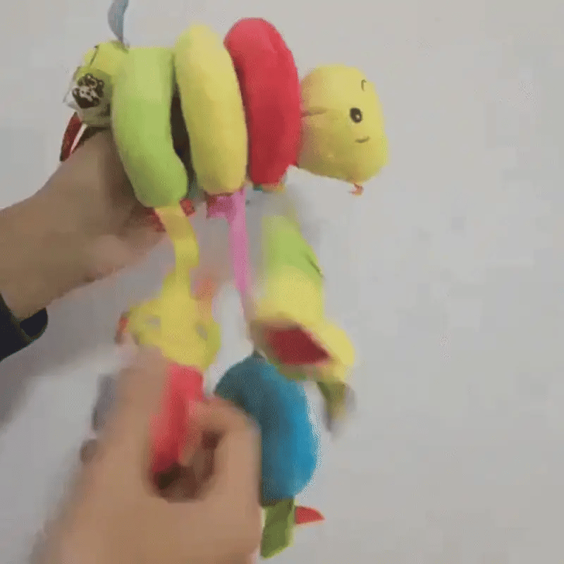 Beruhigendes Label Bettspielzeug – buntes Kuschelkissen fürs Baby